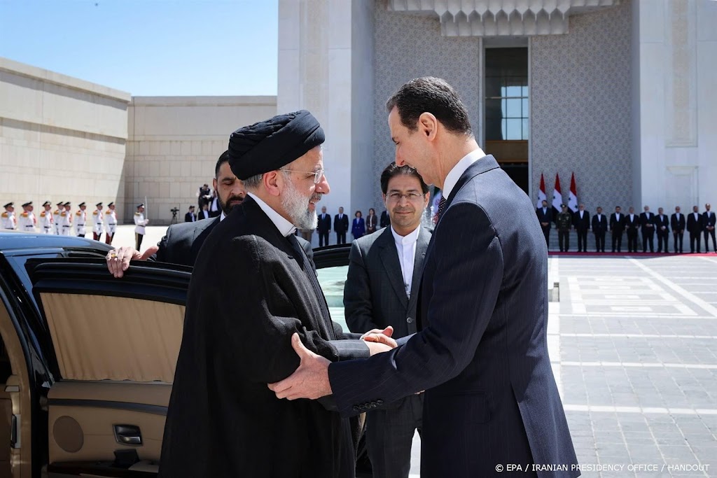 Iraanse president roept in Syrië overwinning uit voor Assad 