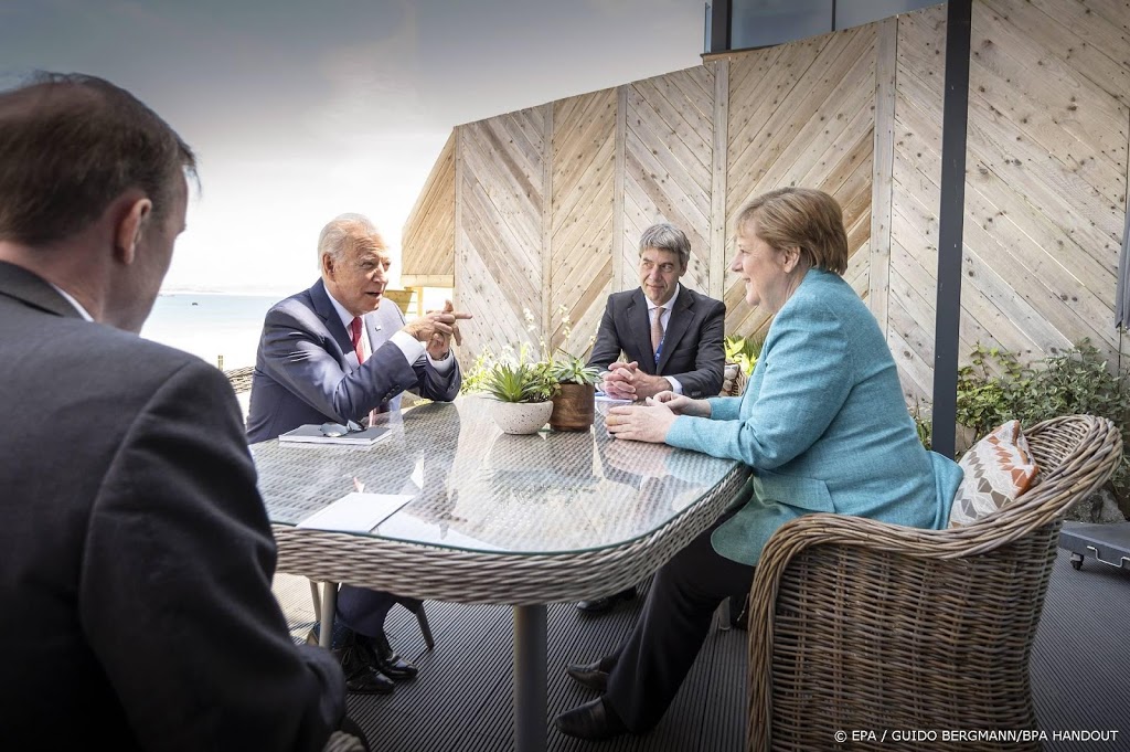 Merkel en Biden strijken plooien glad