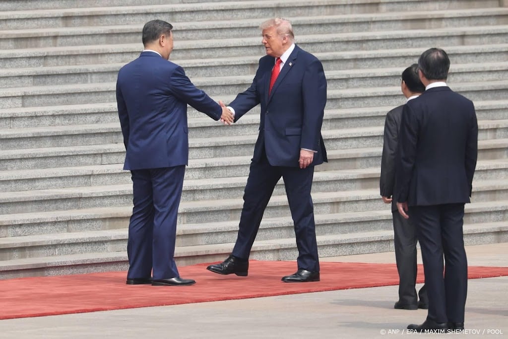 Trump en Xi starten ontmoeting in Beijing met handdruk
