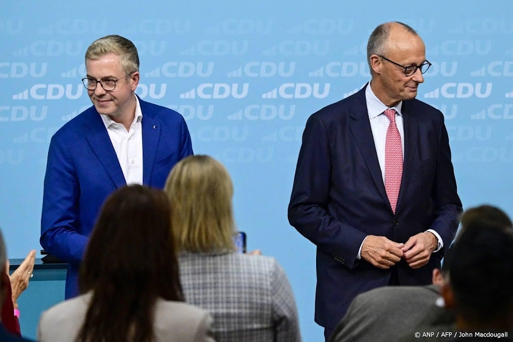 Merz naar campagnebijeenkomst voor verkiezingen Berlijn