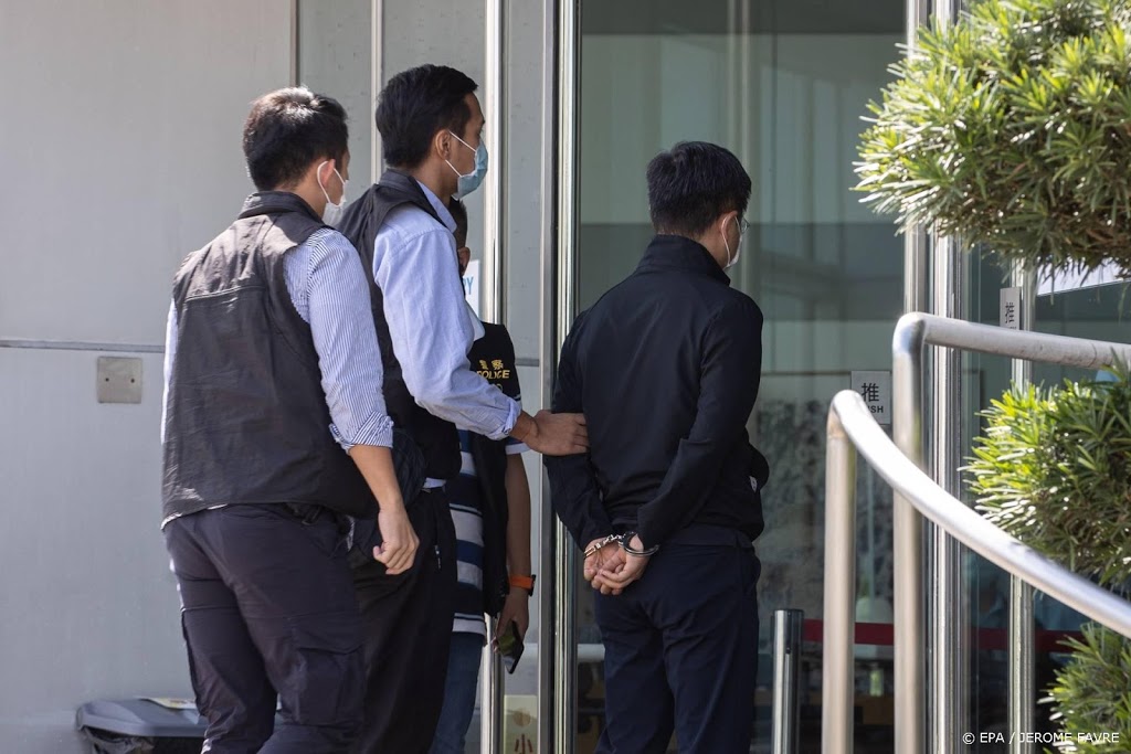Uitgever en hoofdredacteur Hongkongse krant aangeklaagd