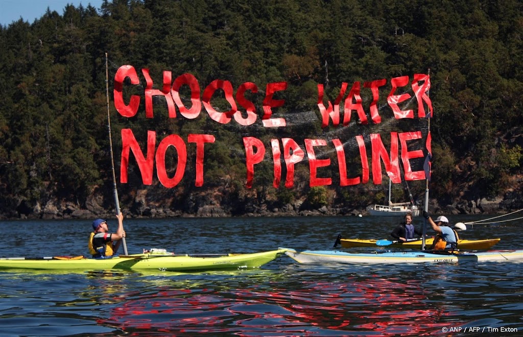 Greenpeace draait rollen om en klaagt energiemaatschappij aan