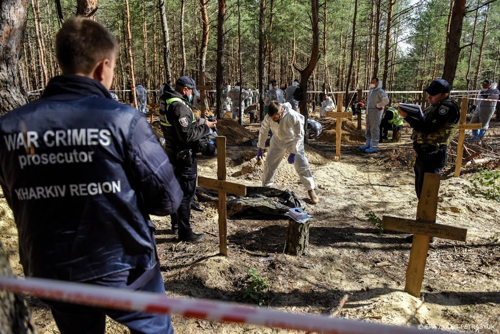 Kiev: veel lijken in massagraf Izjoem vertonen sporen van geweld