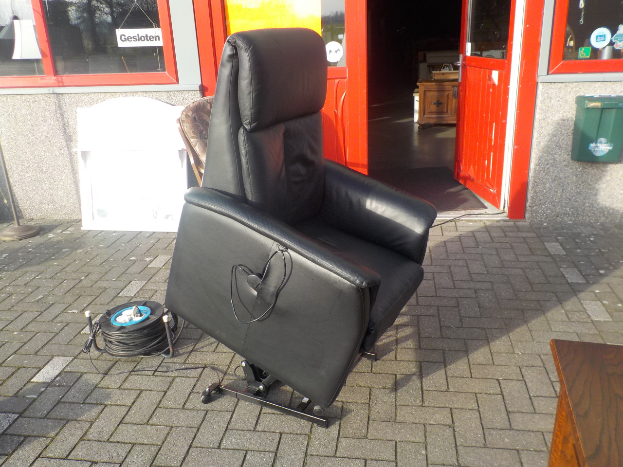 Leren zwarte elektrische sta-op relax fauteuil in goede staat