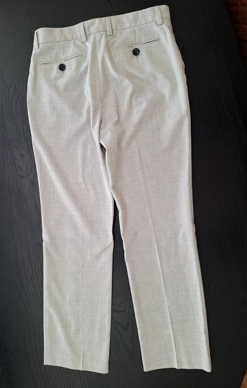 Lichtgrijze pantalon en colbert set maat 152 van Next