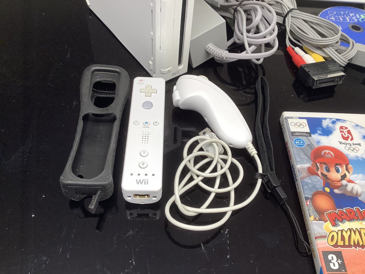 Nintendo Wii compleet, zonder doos met veel spellen.