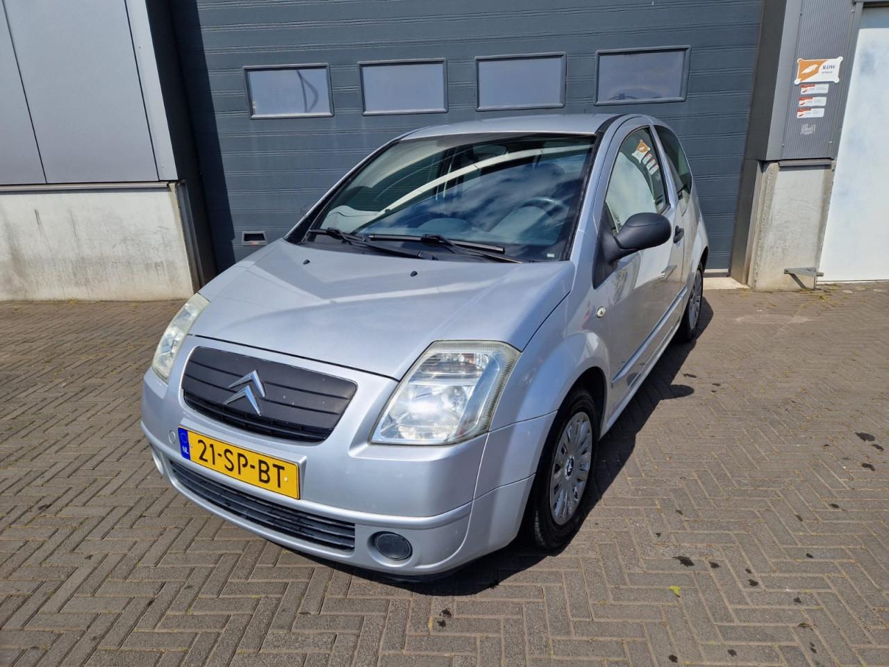 TE KOOP CITROEN C2 1.4i ATTRACTION MET AIRCO EN TREKHAAK 1499,- EURO