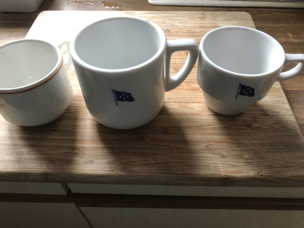 Kopje  Nedlloyd en bekers en kopje De Haas