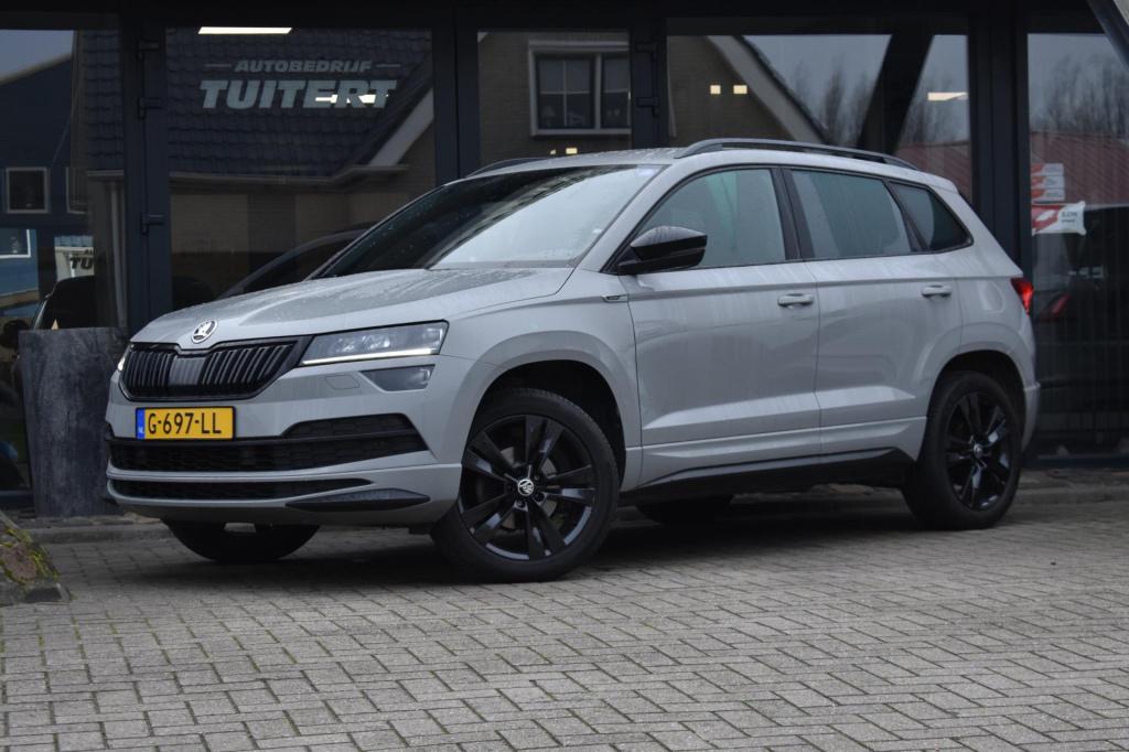 Skoda Karoq 1.5 tsi act sportline | trekhaak | camera | nap | canton | appl