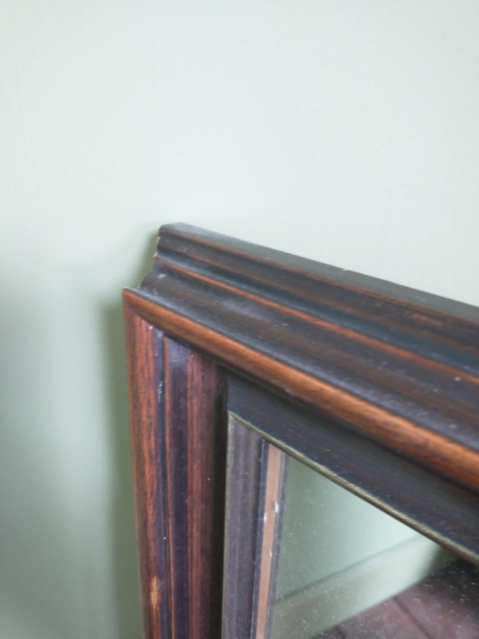 Oude spiegel in nieuwe lijst