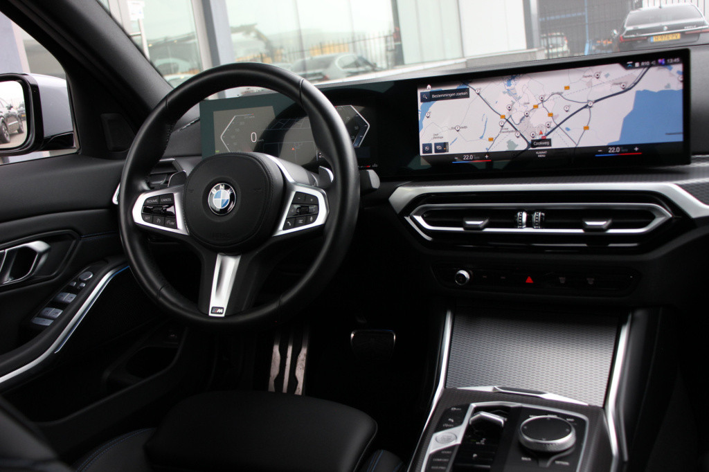 BMW 3-serie 320i m-sport | schuifdak | 20'' styling 795m | el trekhaak