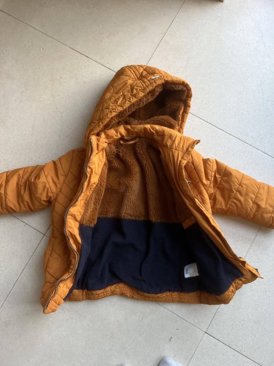 Twee winterjassen maat 104