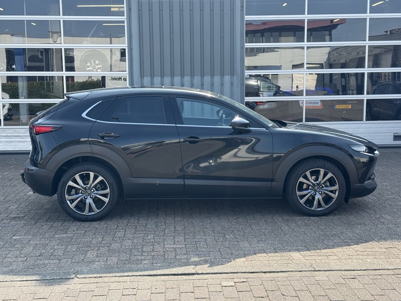 Mazda CX-30 2.0 e-SkyActiv-X M Hybrid Luxury | Leder | Opendak | 360 Camera