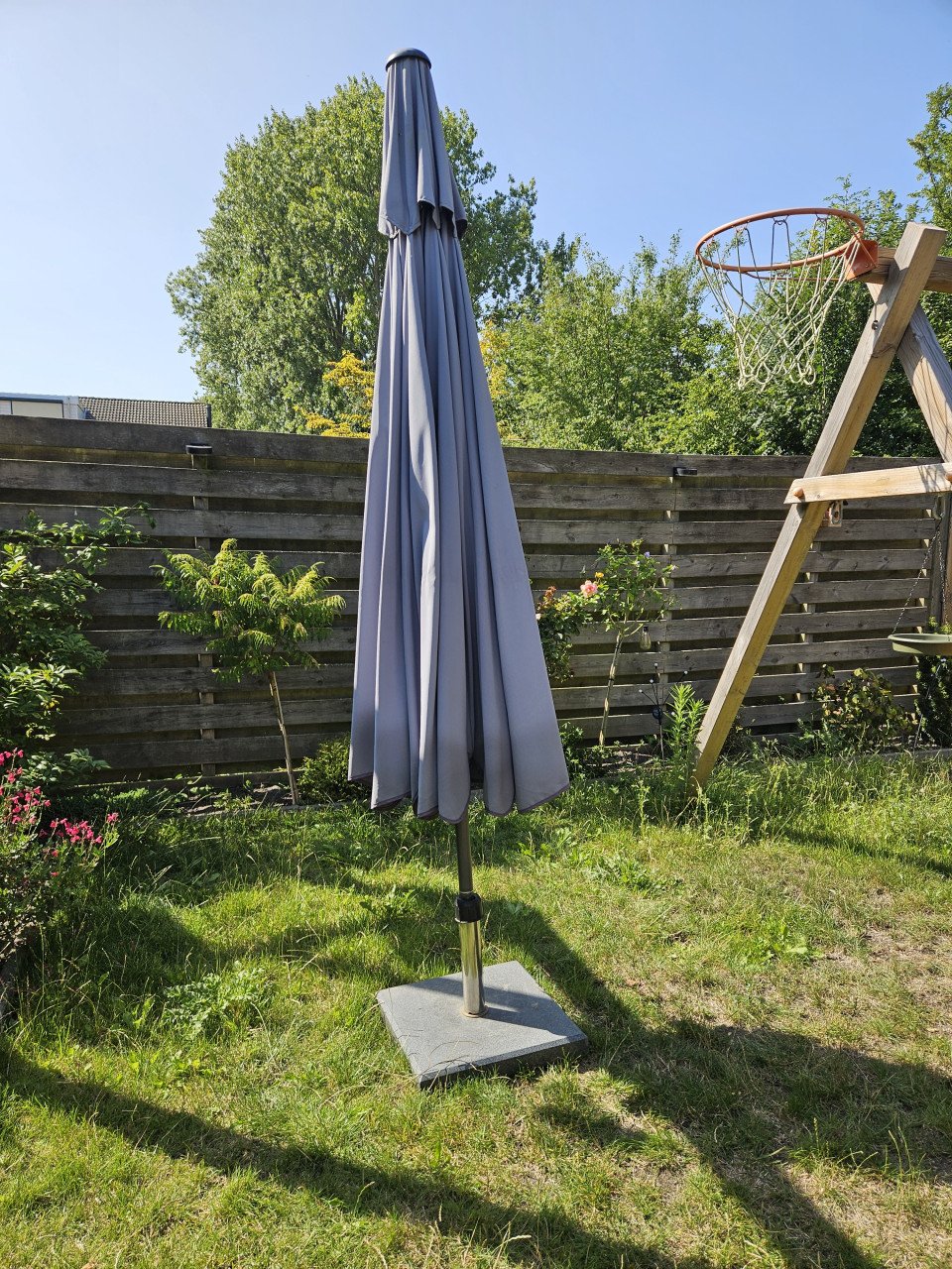 Parasol inclusief zware voet