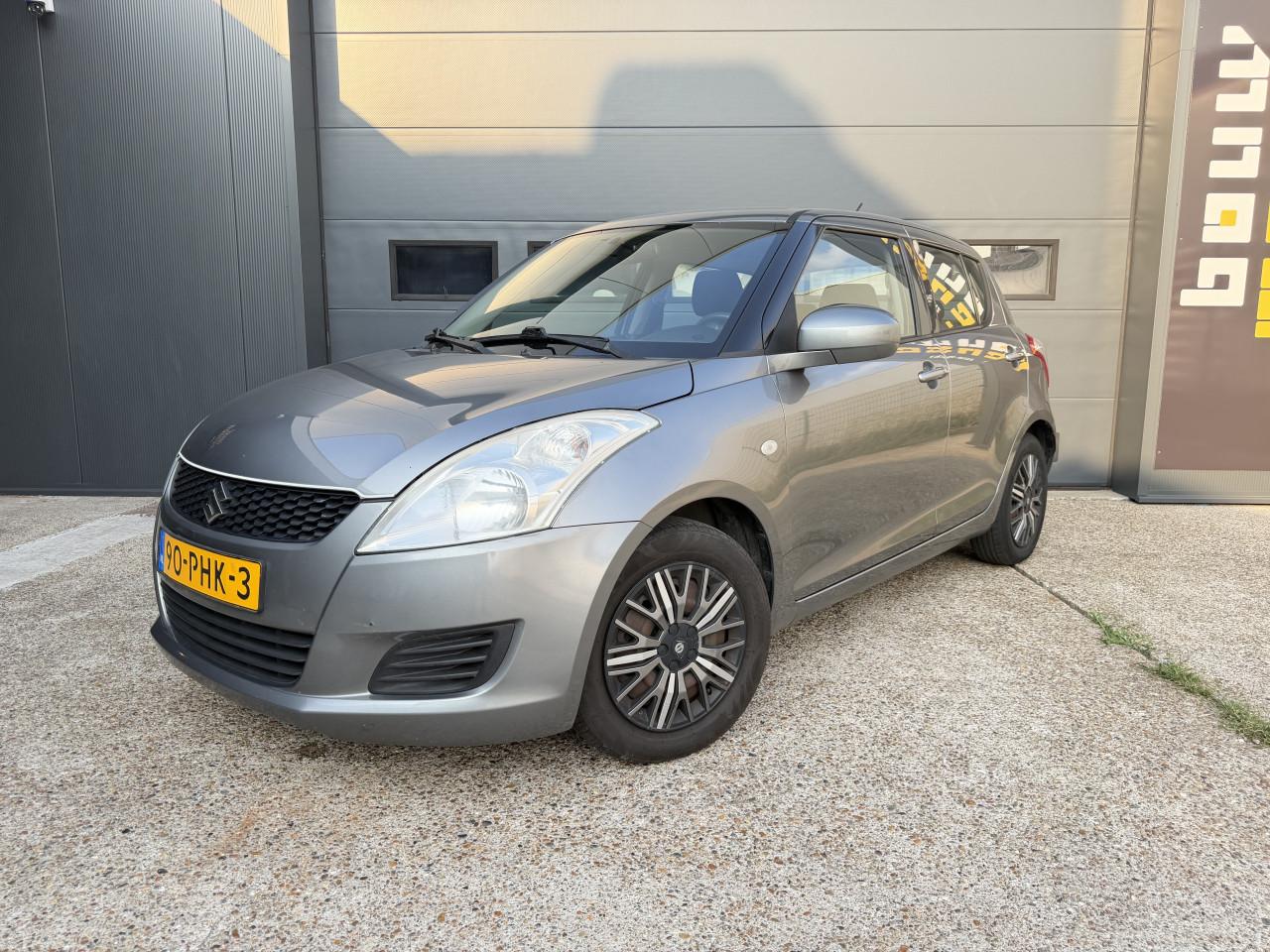 Suzuki Swift 1.2 Comfort EASSS 2011 5Drs Grijs Airco Apk Nap Navi
