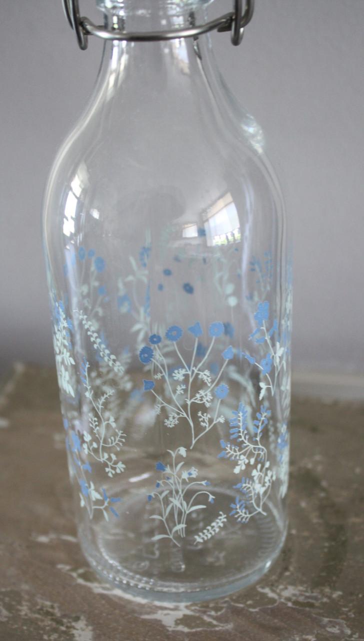 Glazen fles met bloemen print