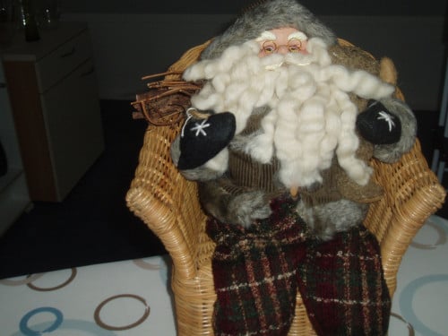 Kerstman in stoeltje