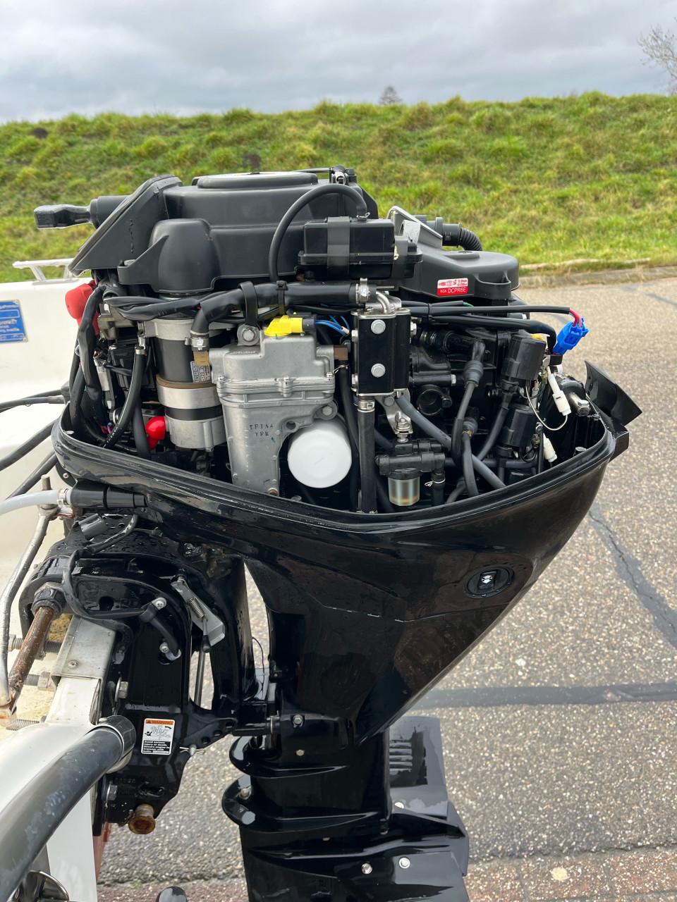 Te koop ryds 435 met mercury 25 pk