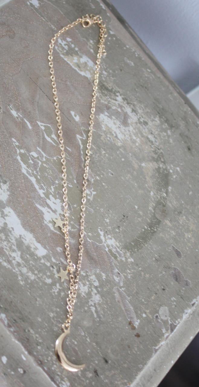 Goudkleurige ketting met ster en maan