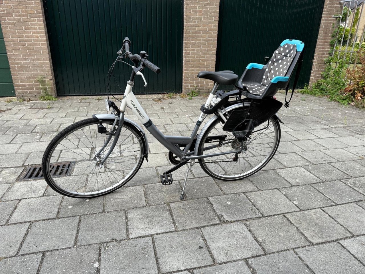 Damesfiets met kinderzitje