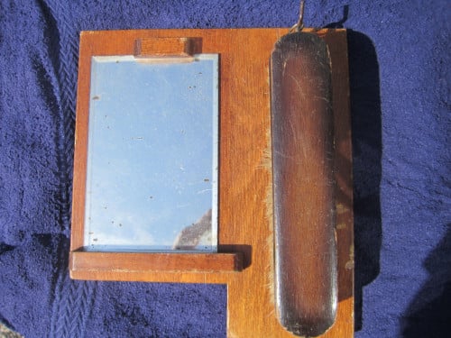 Borstel met spiegeltje