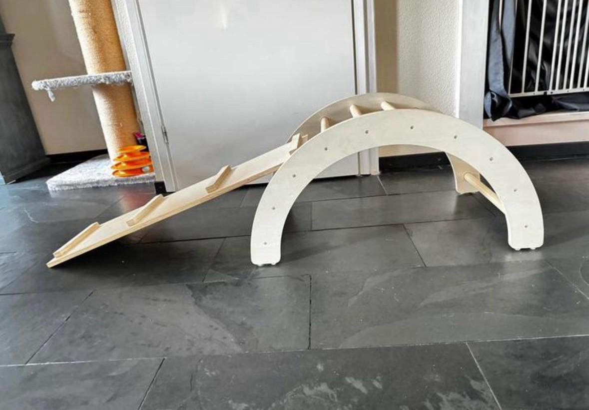 Houten klimboog met glijplank