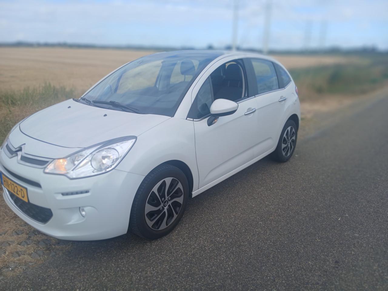 Citroen C3, weinig km, wit, alle opties