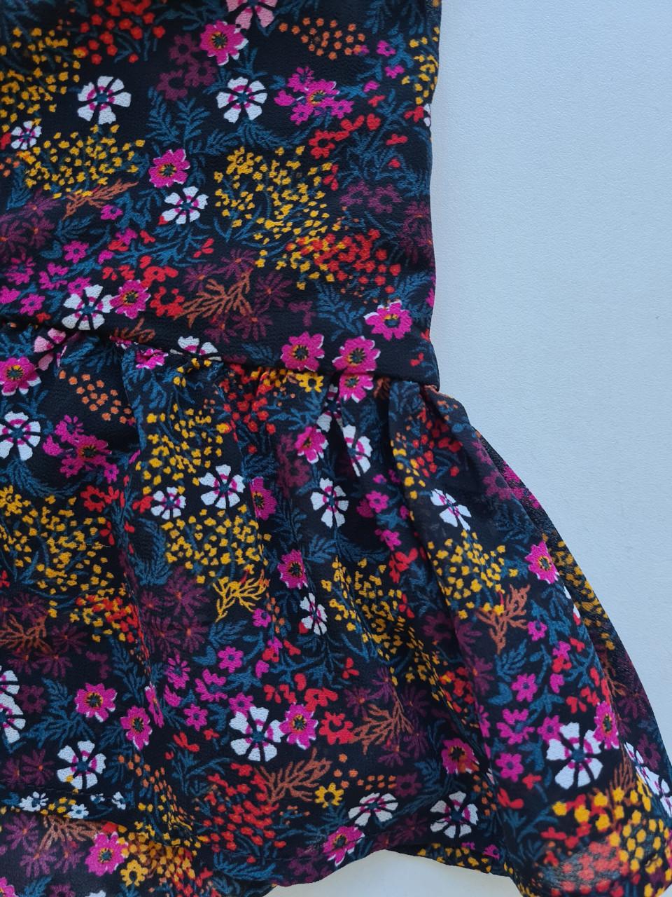 Bloemetjes jurkje met roezel van Girls Maat 128