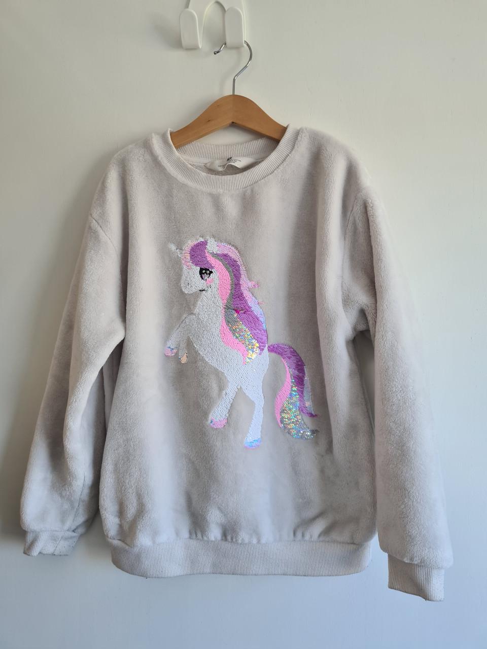 Ecru zachte sweater met pailletten unicorn van H&M  Maat 134-140