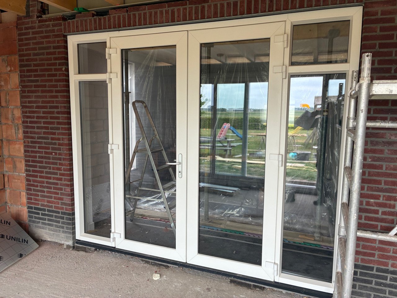 Kunststof kozijn met openslaande deuren