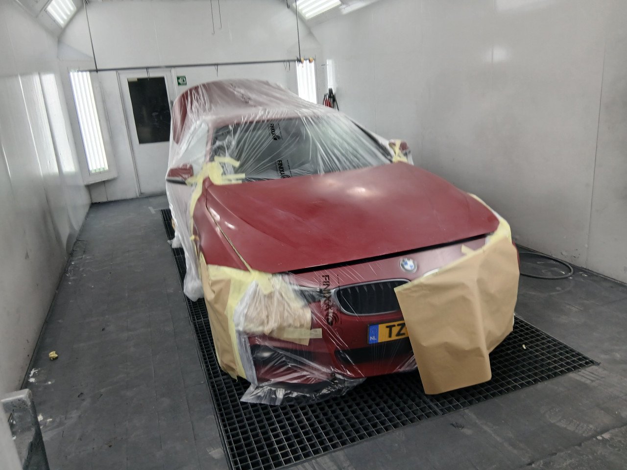 Spuitwerk en schade herstellen