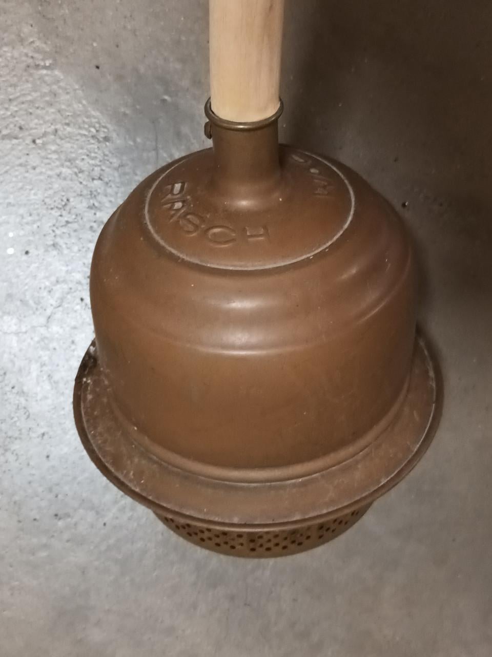 Oude koperen wasstamper