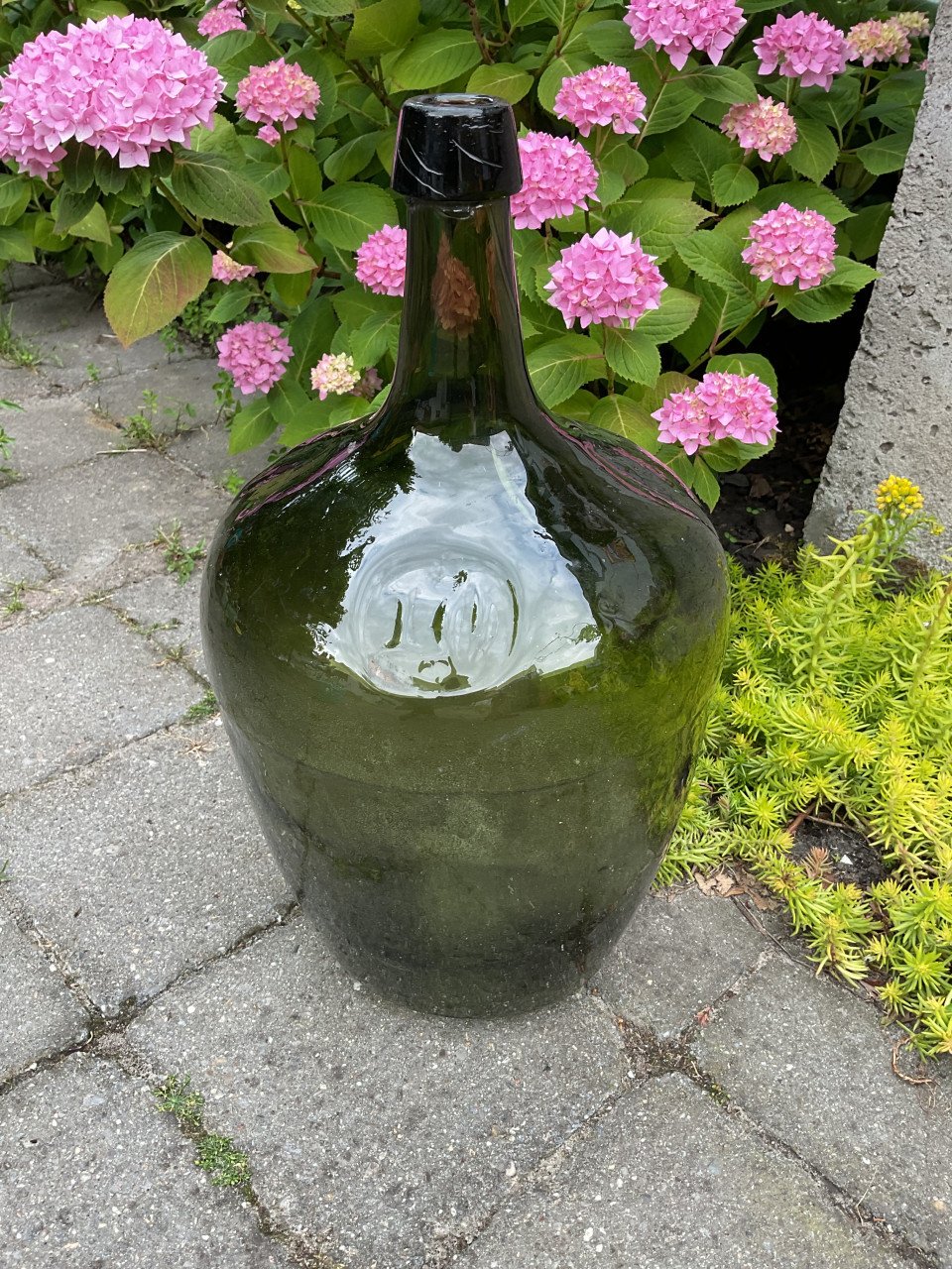 Flessen voor in de tuin