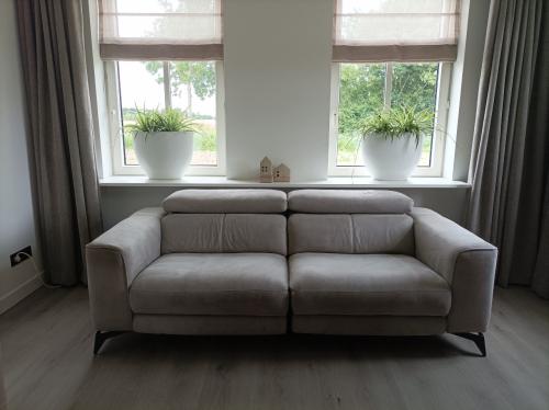 2,5 zits bank met elektrisch relaxsysteem en USB aansluiting