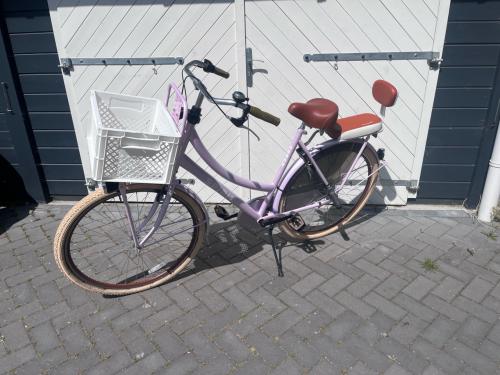 Bijna nieuwe lila mama fiets