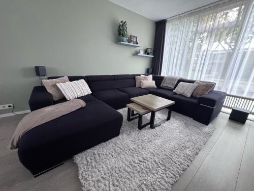 Hoekbank met lounce en verstelbare hoofdsteunen