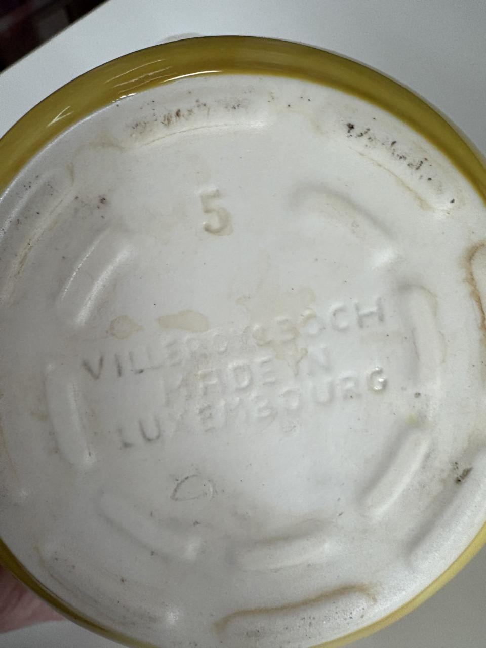 Setje oude theepotten geel