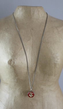 Zilverkleurige kettin met hanger dnasend spook