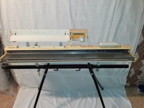 Breimachine Toyota 105 cm breed met veel toebehoren