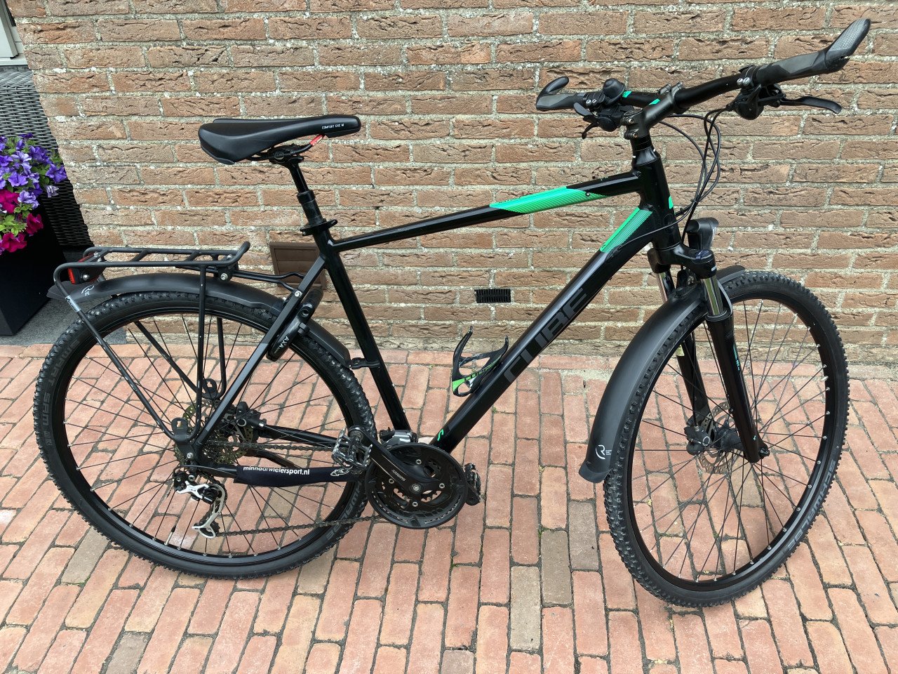 2x Cube Nature hybride fietsen (heren + dames) – Goed onderhouden