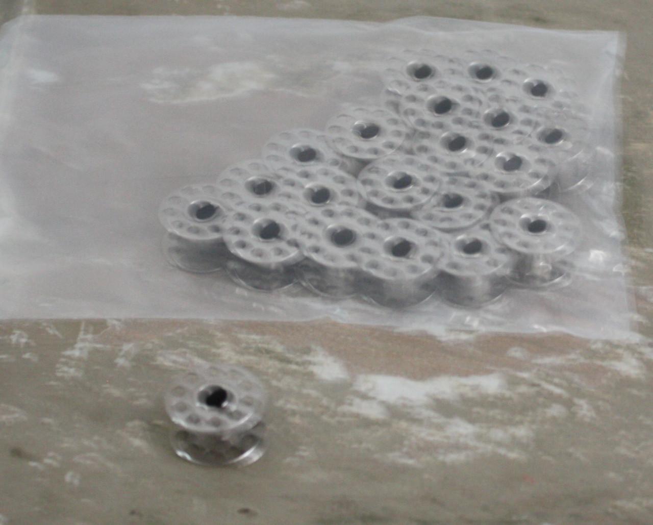 Set van 21 universele spoeltjes