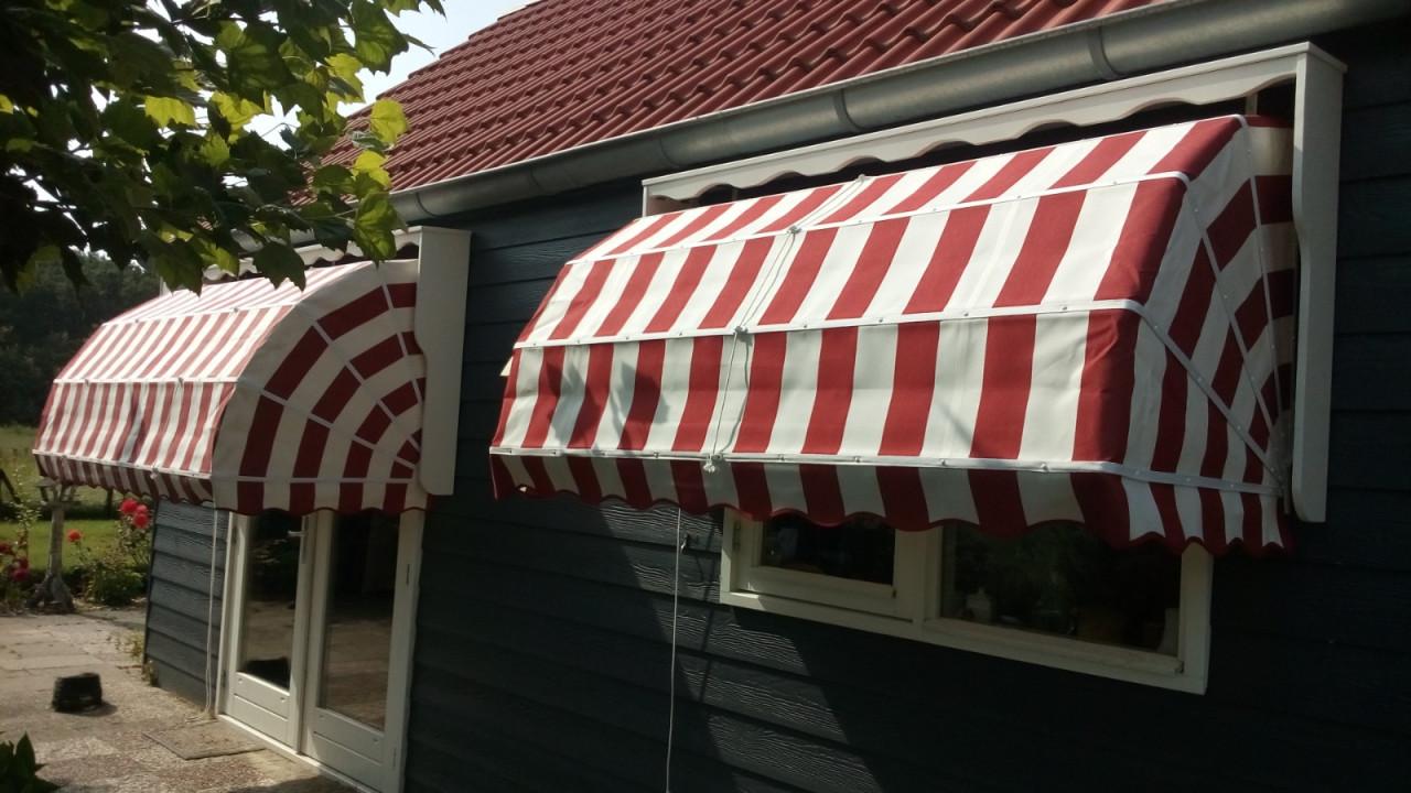 Op maat gemaakte verduisterende zonwering + herstofferen van zonneschermen