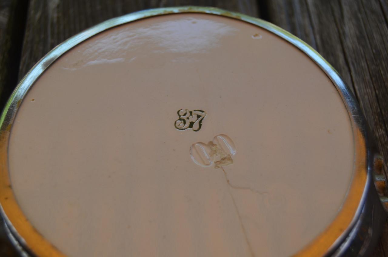 Blauw/wit aardewerk / tin flessenonderzetter