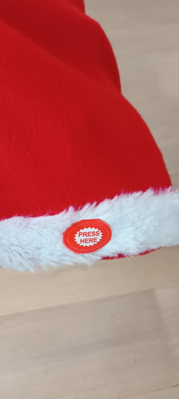 Kerstmuts met muziekje en beweging