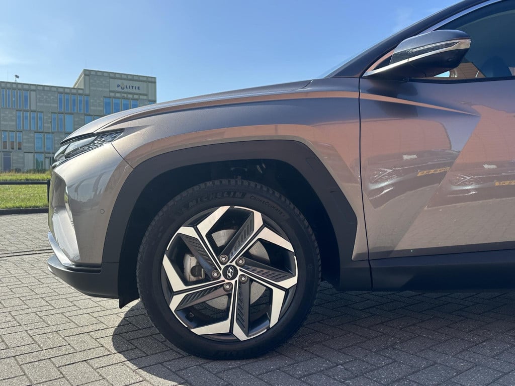 Hyundai Tucson 1.6 t-gdi phev premium 4wd | trekhaak | vol-leder | adapt. c