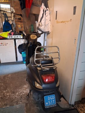 Scooter met WOK
