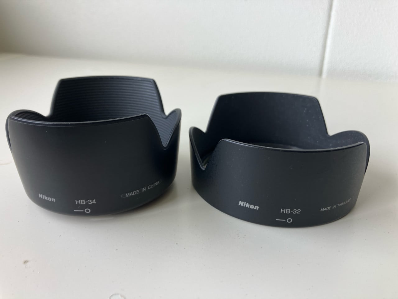 2x zonnekap Nikon