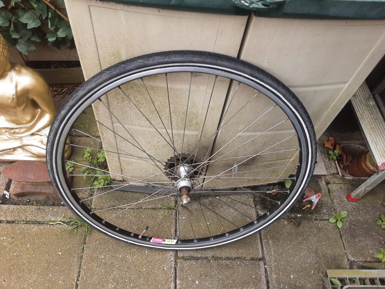 28 inch shimano achterwiel, 7 speed cassette, uitvalnaaf