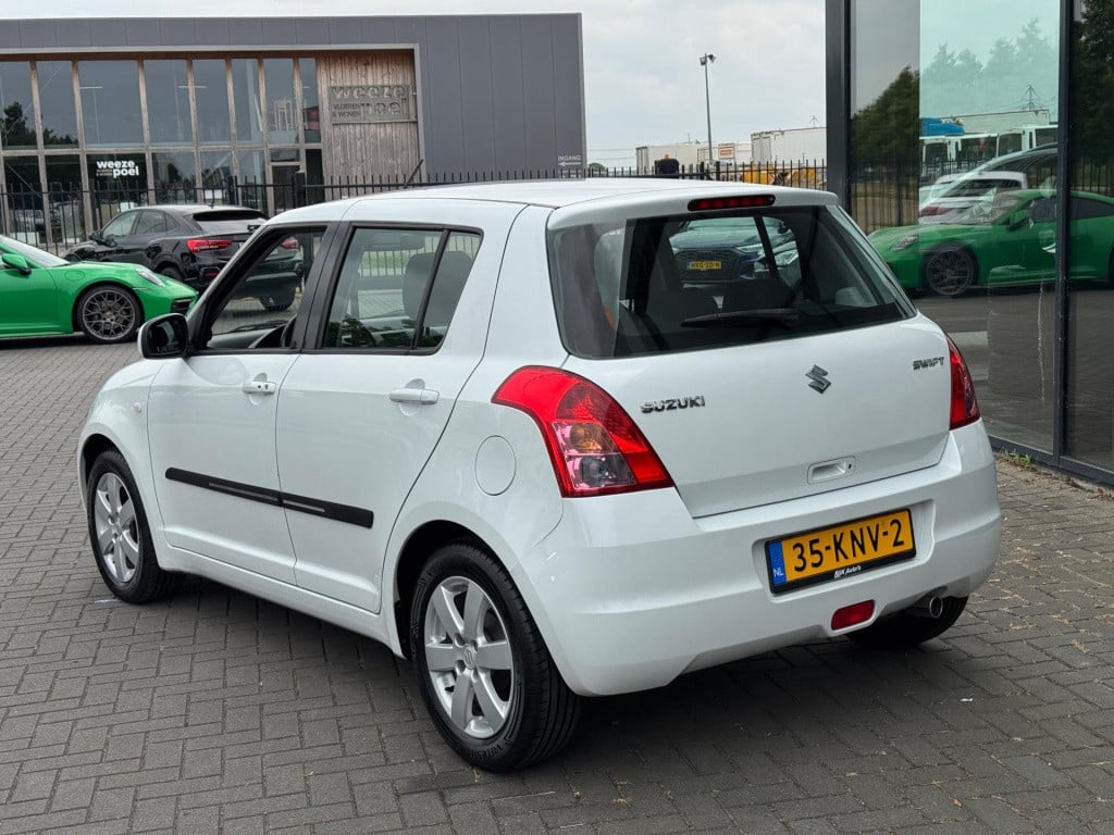 Suzuki Swift 1.3 exclusive* airco * 5drs * carplay