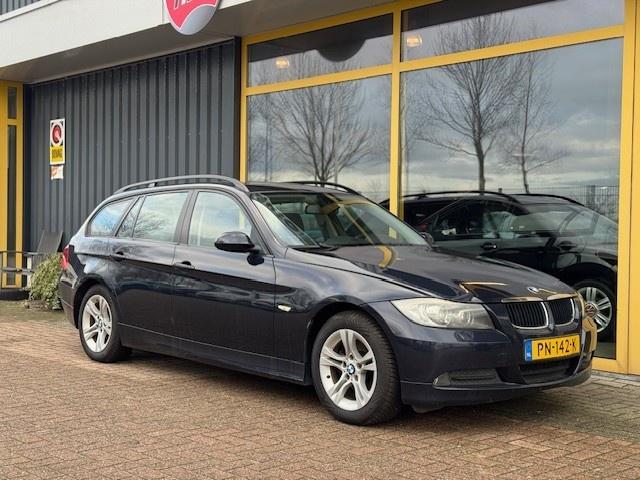 BMW 3-serie touring 318i | pano | trekhaak | xenon | garantie